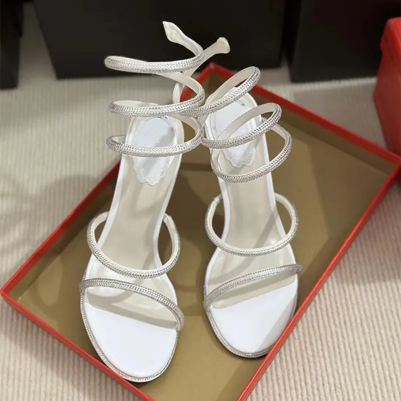 Sandalias de verano de moda para mujer, con diseño de serpiente y cristales, adornadas con lujosos diamantes de imitación y tacones finos estilo gladiador. Ideales para fiestas y eventos.