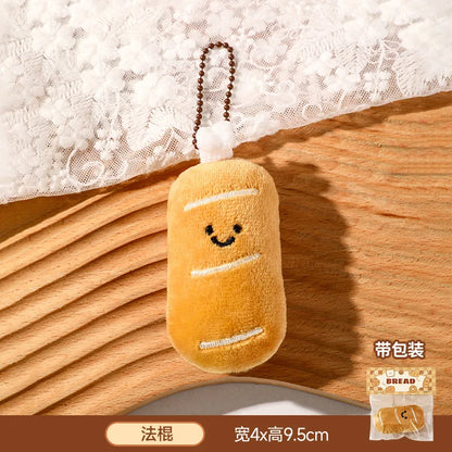 Panes lindos, bolsas de peluche, colgantes, llaveros, accesorios creativos para muñecas pequeñas, mochilas de dibujos animados para niñas al por mayor.