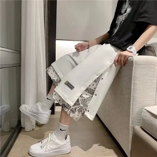 Pantalones cortos de estilo americano con cintura elástica para hombre, marca de moda, estilo hip hop, ropa de calle, holgados, de dos piezas, estilo casual de verano.