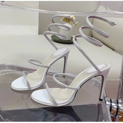 Sandalias de verano de moda para mujer, con diseño de serpiente y cristales, adornadas con lujosos diamantes de imitación y tacones finos estilo gladiador. Ideales para fiestas y eventos.