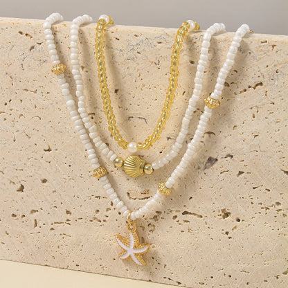 Gargantilla vintage de cuentas multicapa apiladas, hecha a mano, con colgante de concha de estrella de mar, para mujer, joyería para fiesta en la playa de verano.