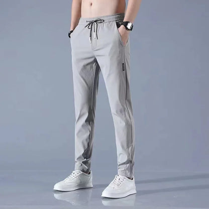 Pantalones deportivos largos de seda de hielo para hombre, de verano, nuevos, finos, informales, de negocios, elásticos, transpirables, de pierna recta, de talla grande