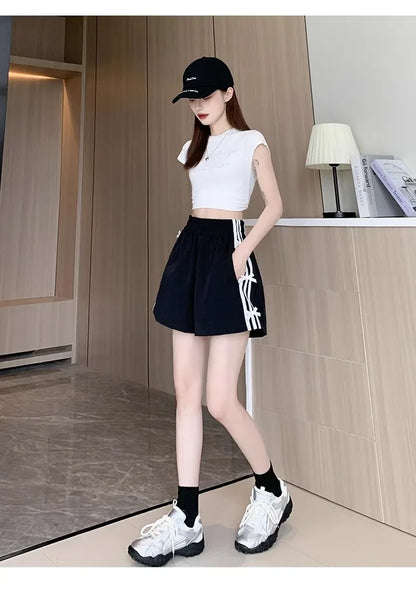Pantalones cortos deportivos coreanos de Goft con lazo dulce a rayas en blanco y negro, pantalones deportivos de moda de verano, cómodos, transpirables, de secado rápido