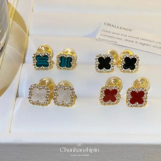 Pendientes clásicos de flor de cuatro hojas para mujer, sin perforaciones, con espiral antimosquitos, con clip, sin dolor, a la moda, versátiles y para desplazamientos diarios.