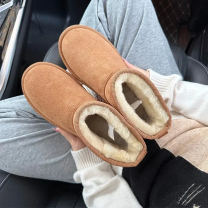 Botas de nieve integradas de piel de oveja y lana para hombres y mujeres, cuero auténtico y piel, botas de invierno gruesas y cálidas para mujer.