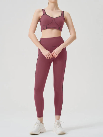 Ropa de yoga, un conjunto deportivo de alta gama, de color sólido, de alta elasticidad, ajustado y de alta intensidad, ropa de fitness para mujer adecuada para el gimnasio.