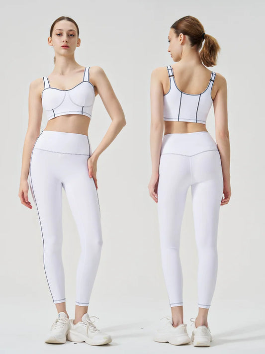 Ropa de yoga, un conjunto deportivo de alta gama, de color sólido, de alta elasticidad, ajustado y de alta intensidad, ropa de fitness para mujer adecuada para el gimnasio.