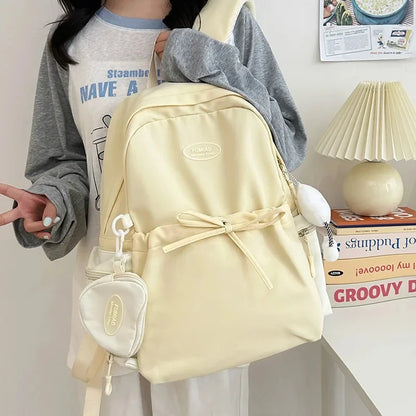 Bonita mochila escolar de nailon con doble hombro para niña, capacidad de 20 a 35 litros, forro de polietileno, correa curva, diseño de color liso.