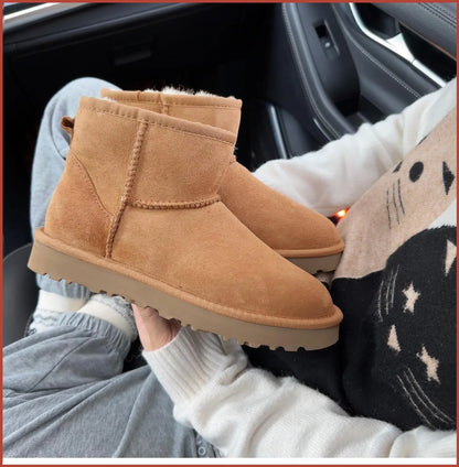 Botas de nieve integradas de piel de oveja y lana para hombres y mujeres, cuero auténtico y piel, botas de invierno gruesas y cálidas para mujer.