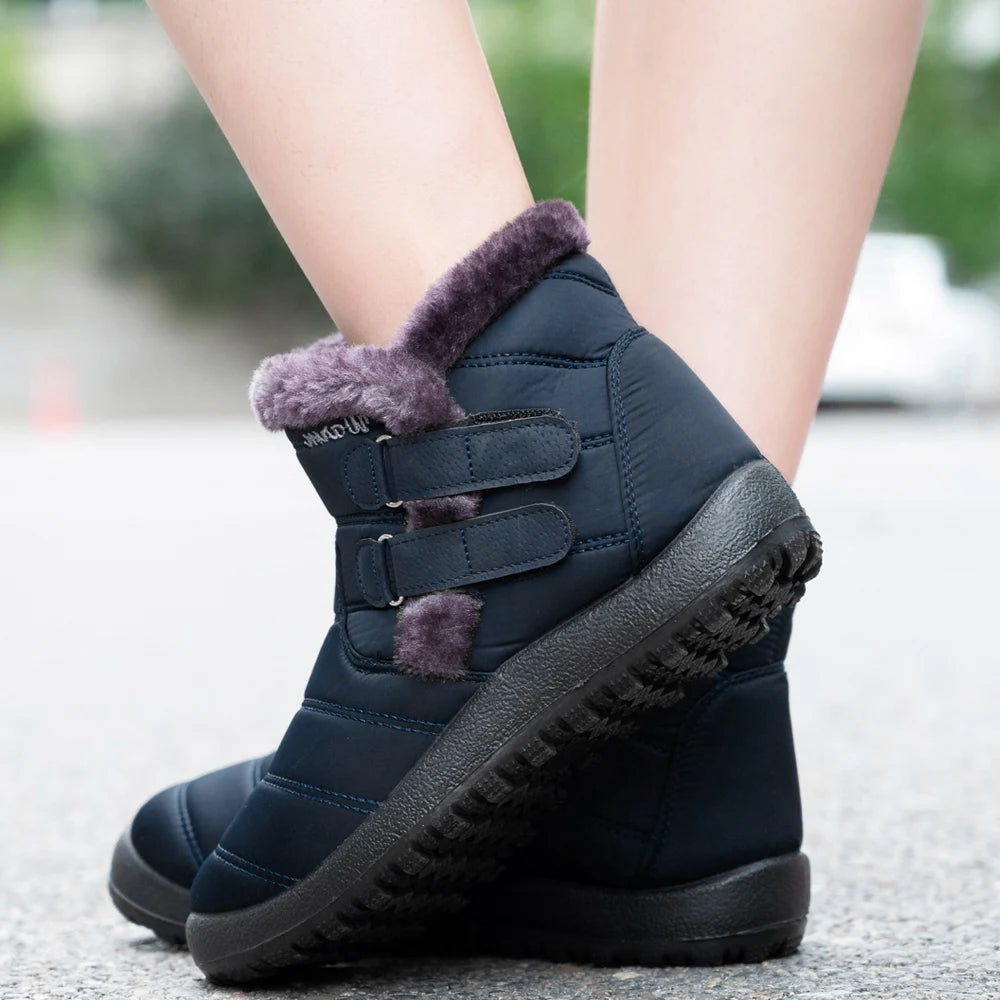 Botas de nieve cálidas de piel para mujer, botines de tobillo de talla grande, informales, planos, de invierno, antideslizantes, a la moda, impermeables