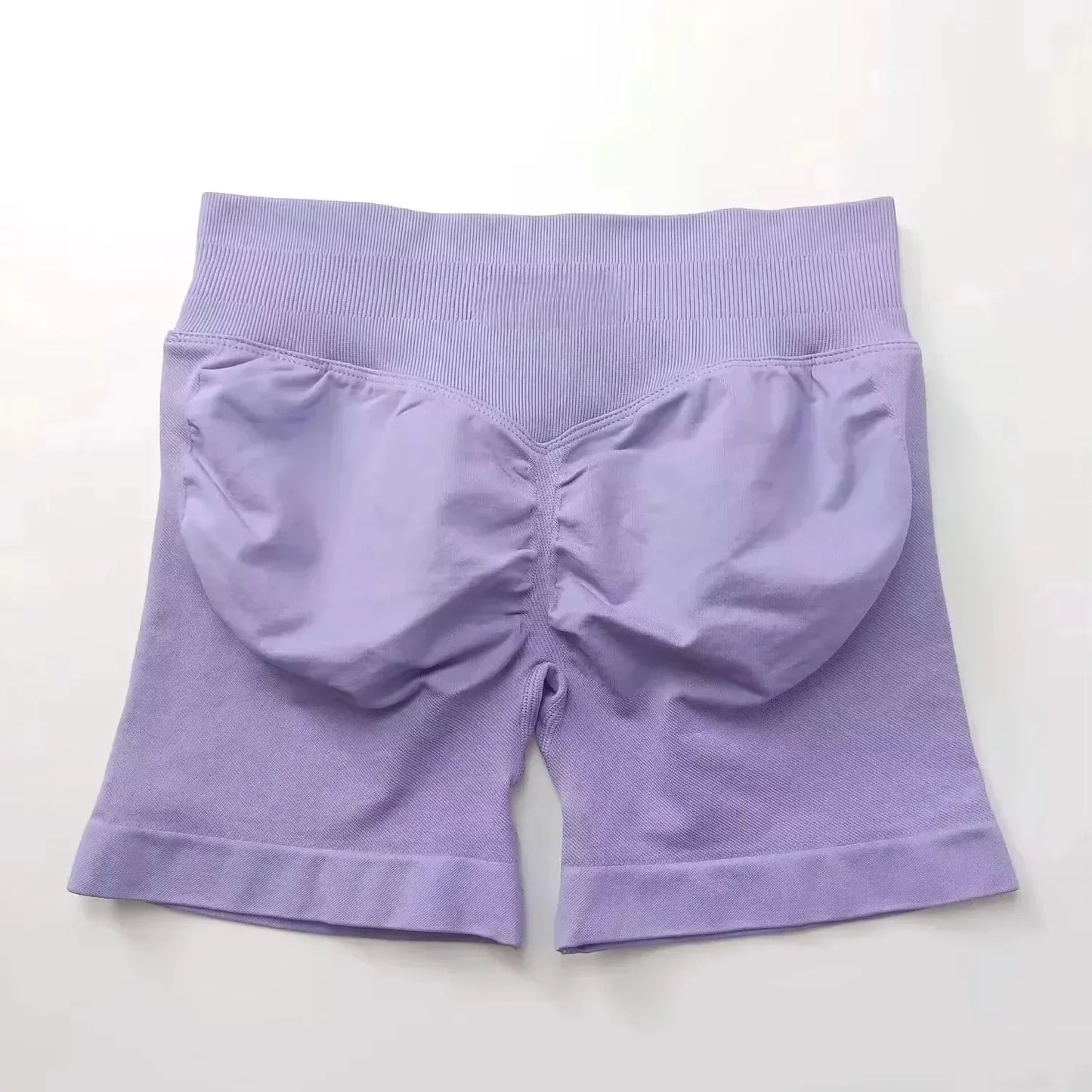 Pantalones cortos deportivos de yoga para mujer, de verano, con efecto piel de melocotón, con bolsillo en la cadera, cintura alta, levantamiento de cadera, secado rápido.