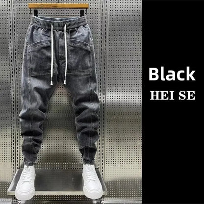 Pantalones vaqueros holgados de talla grande para hombre, informales, de moda, para otoño e invierno, con puños, estilo coreano, versátiles, duraderos, cómodos y ajustados.