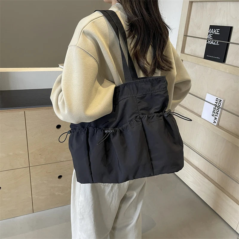 1 bolso de mano de gran capacidad, moderno, de lona, para el hombro, para el trabajo y los desplazamientos.