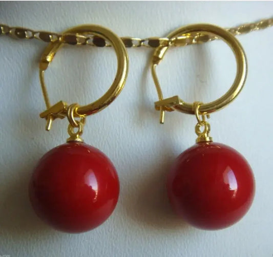 Pendientes de perlas de concha roja de los Mares del Sur de 14 mm con coral tahitiano.