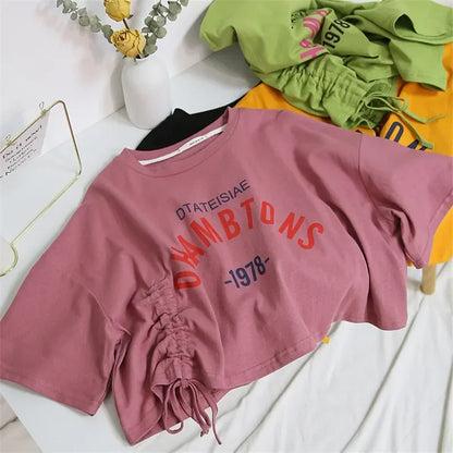 Camiseta corta con cordón y estampado de moda para mujer, diseño informal de manga corta, color negro, verde, rosa, blanco y naranja.