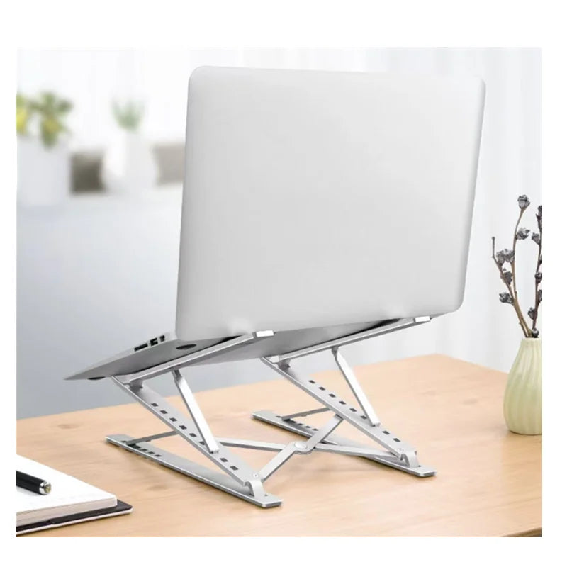 Soporte plegable y ajustable de aluminio para ordenador portátil, tableta o PC. Disipación de calor.