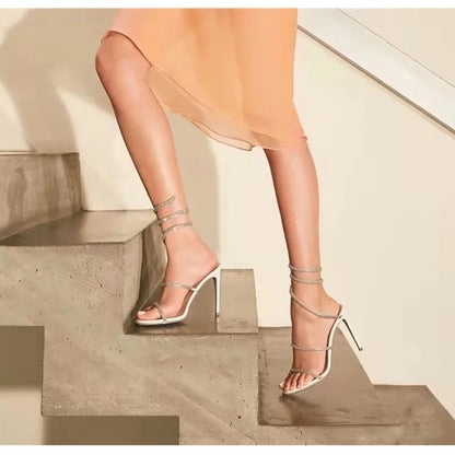 Sandalias de verano de moda para mujer, con diseño de serpiente y cristales, adornadas con lujosos diamantes de imitación y tacones finos estilo gladiador. Ideales para fiestas y eventos.