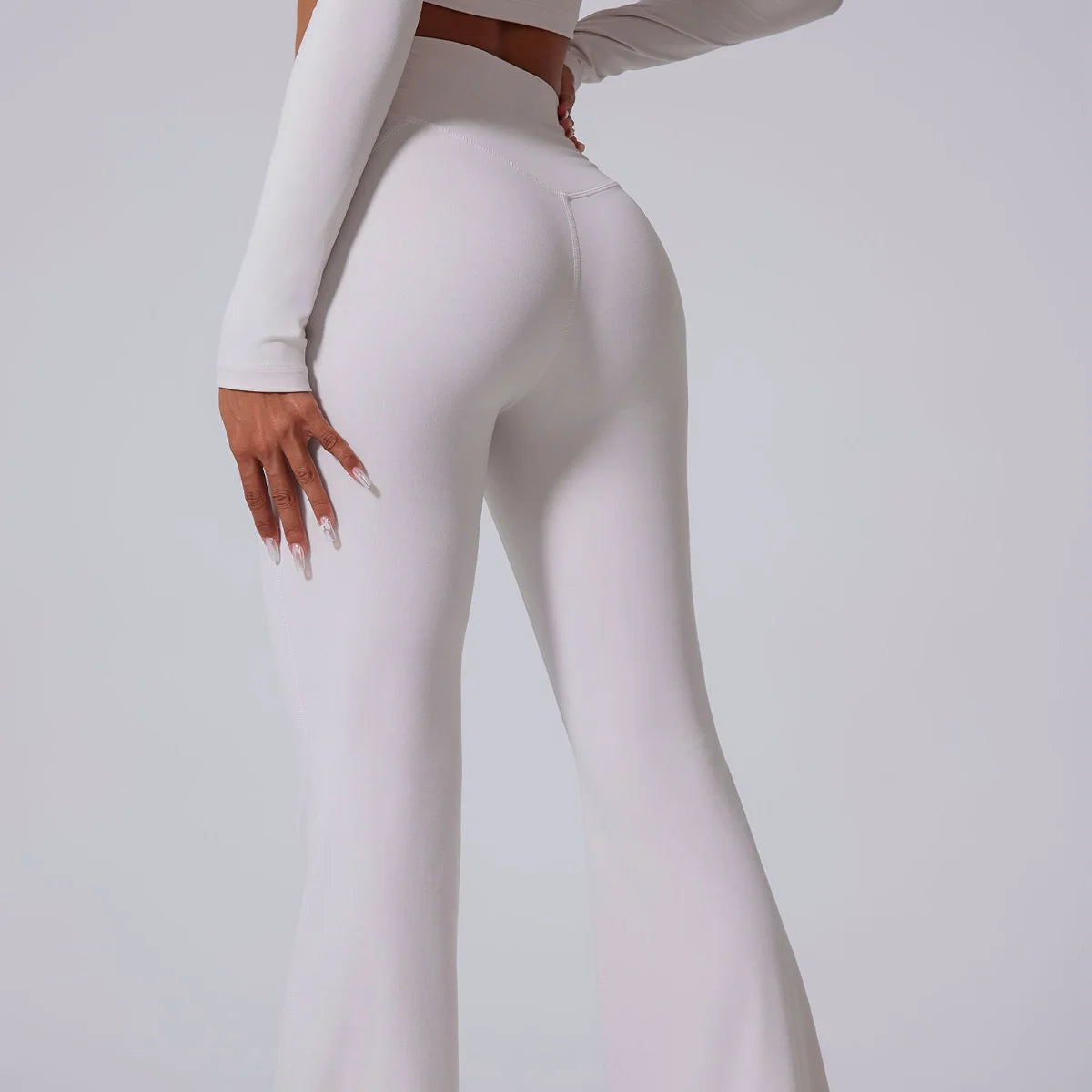 Conjunto de yoga para mujer: pantalones acampanados, ropa deportiva para gimnasio, top push-up de manga larga, estilo deportivo y sexy.