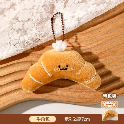 Panes lindos, bolsas de peluche, colgantes, llaveros, accesorios creativos para muñecas pequeñas, mochilas de dibujos animados para niñas al por mayor.