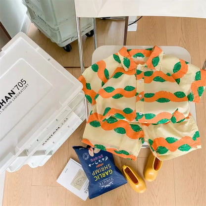 Ropa para niños 2025, nuevo traje de flores de moda para bebé, camisa de manga corta, pantalones cortos, elegante conjunto de dos piezas de pantalones cortos casuales retro.