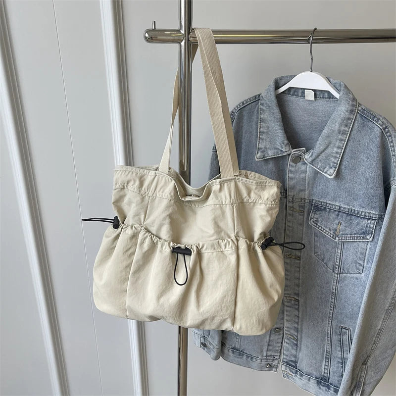 1 bolso de mano de gran capacidad, moderno, de lona, para el hombro, para el trabajo y los desplazamientos.