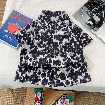 Ropa para niños 2025, nuevo traje de flores de moda para bebé, camisa de manga corta, pantalones cortos, elegante conjunto de dos piezas de pantalones cortos casuales retro.