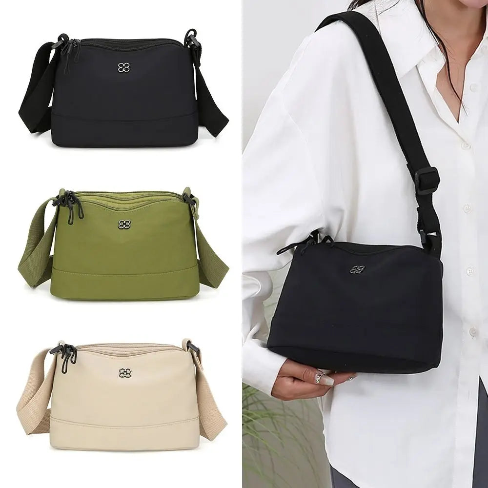 Bolso de hombro de nailon suave y moderno para mujer, de color liso, estilo informal, con múltiples bolsillos, bolso de mano para estudiante.