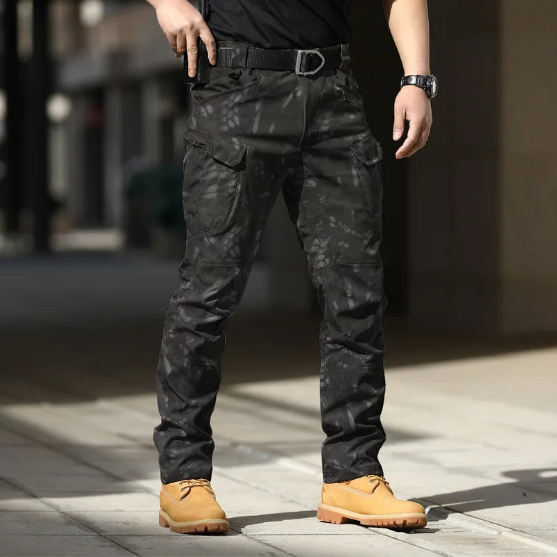 Pantalones tácticos militares urbanos para hombre, estilo cargo, con múltiples bolsillos, impermeables, resistentes al desgaste, ideales para entrenamiento informal.
