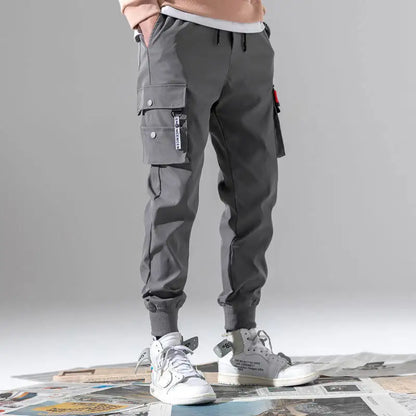Pantalones deportivos finos de moda para hombre, pantalones casuales para correr, pantalones cargo de calle 2020, pantalones multibolsillos para hombre, pantalones deportivos para gimnasios y fitness para hombre.